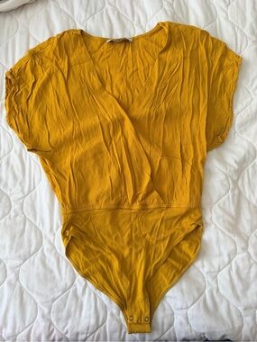 Mustard Yellow V-Neck Women’s Bodysuit